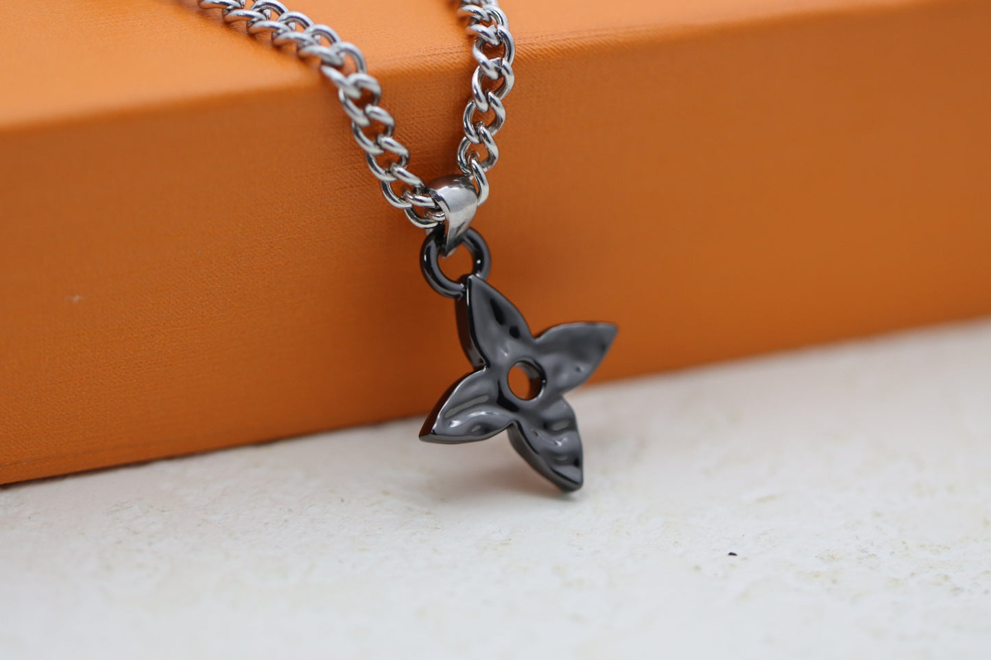 Titanium floral letter necklace