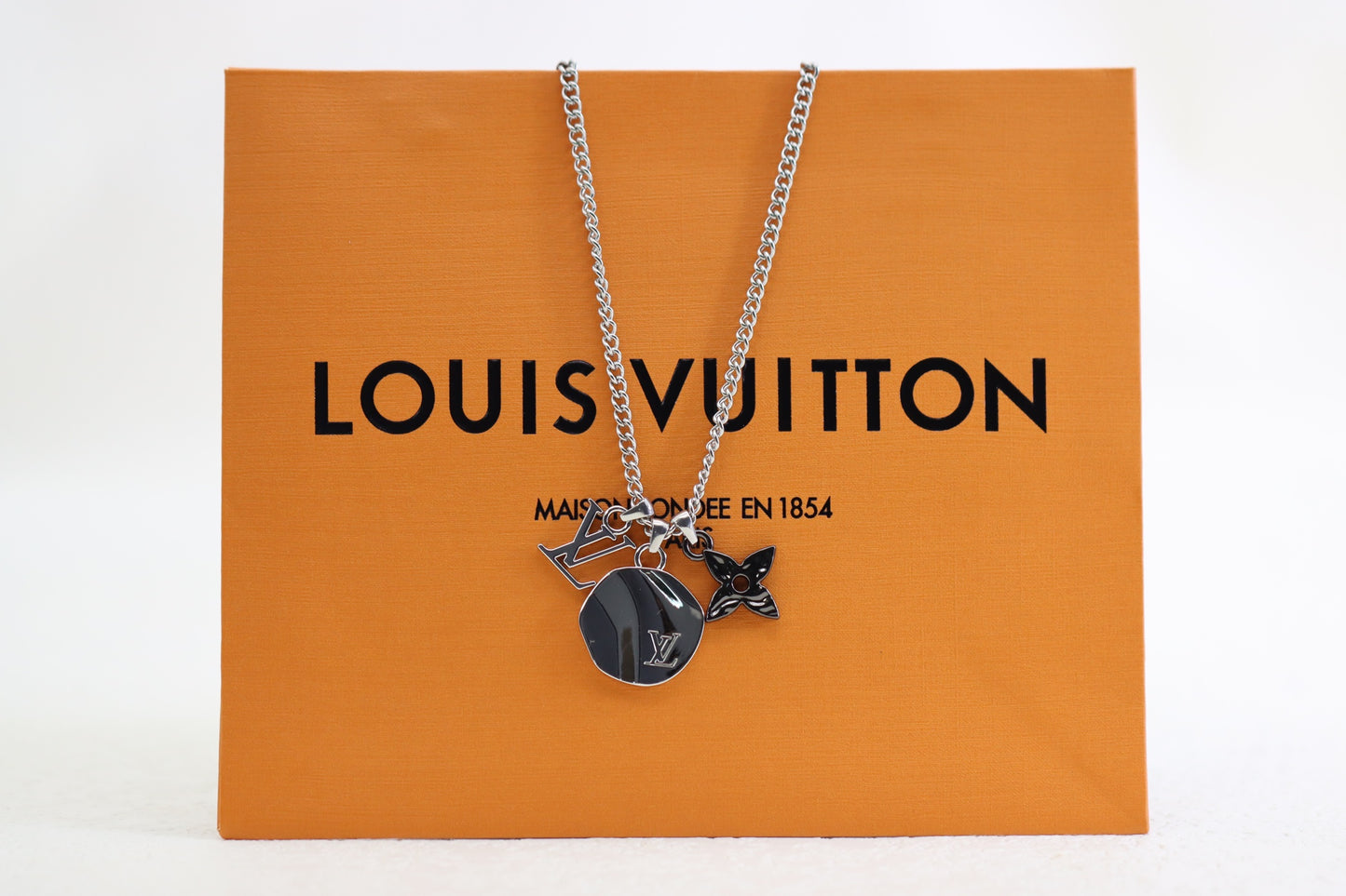 Titanium floral letter necklace