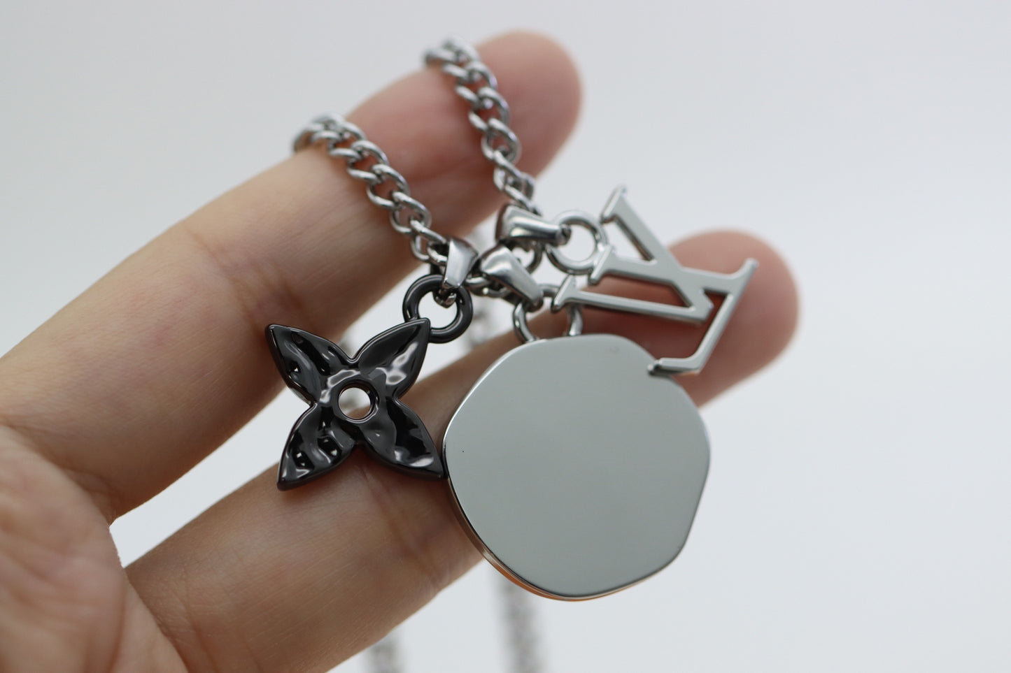 Titanium floral letter necklace