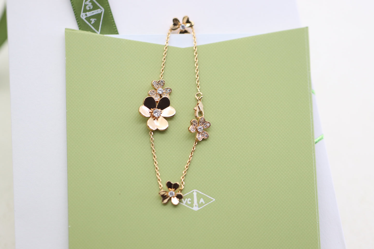 Rose gold three-flower four-leaf clover bracelet