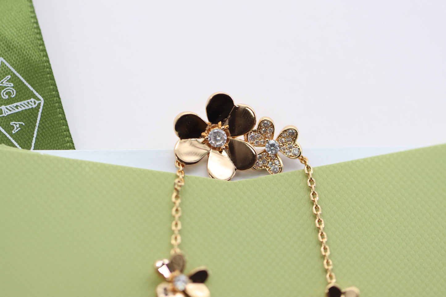 Rose gold three-flower four-leaf clover bracelet