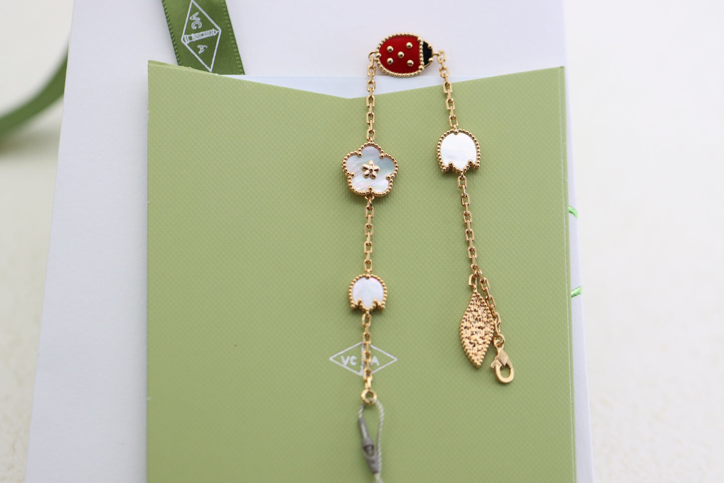 Rose gold ladybug and flower four-leaf clover five-flower bracelet