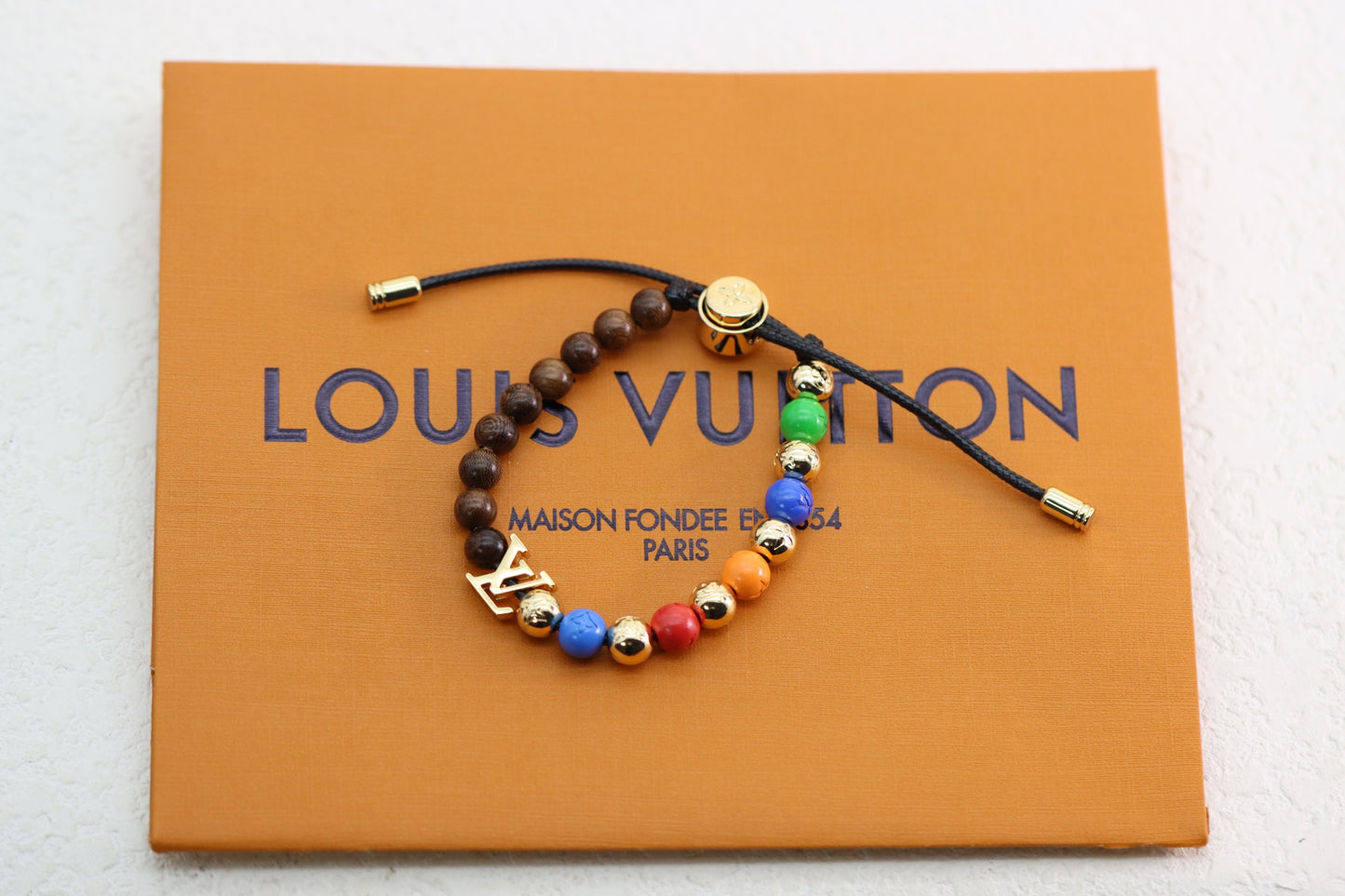 Silver Alphabet Rainbow Mahogany Beaded Bracelet