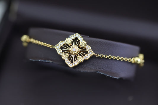 Gold hollow diamond four-leaf clover double-sided bracelet