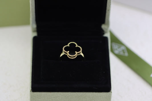 Champagne gold and black onyx four-leaf clover ring