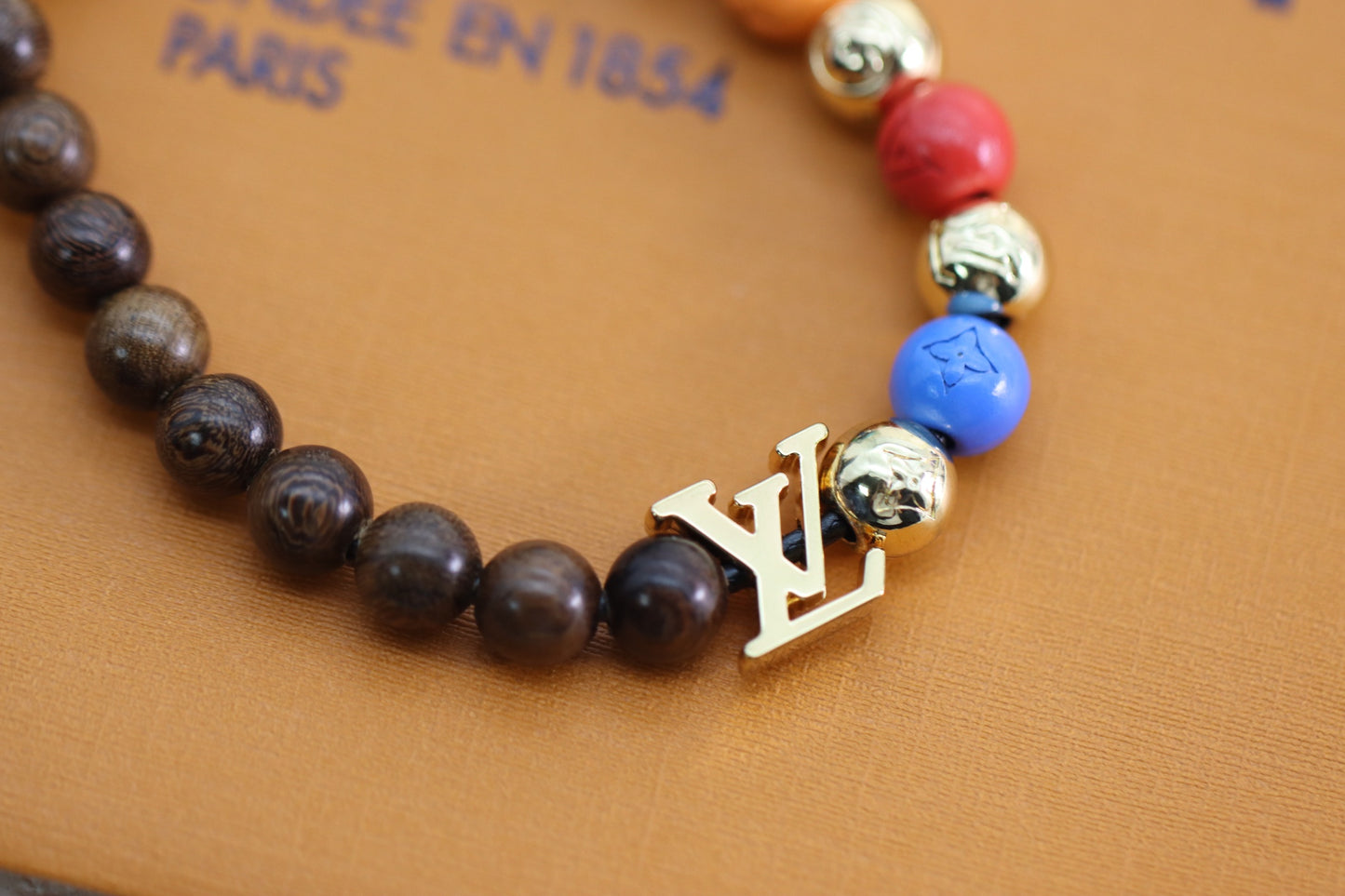 Silver Alphabet Rainbow Mahogany Beaded Bracelet