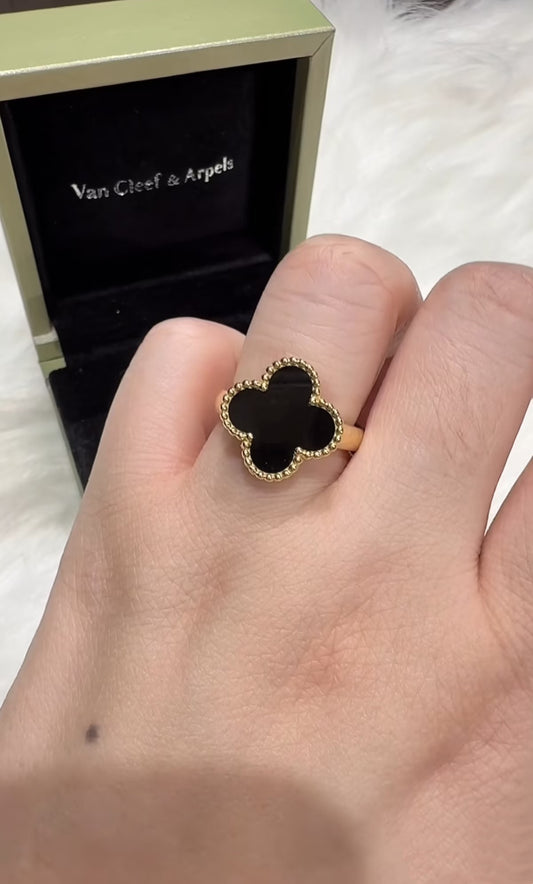 Champagne gold and black onyx four-leaf clover ring